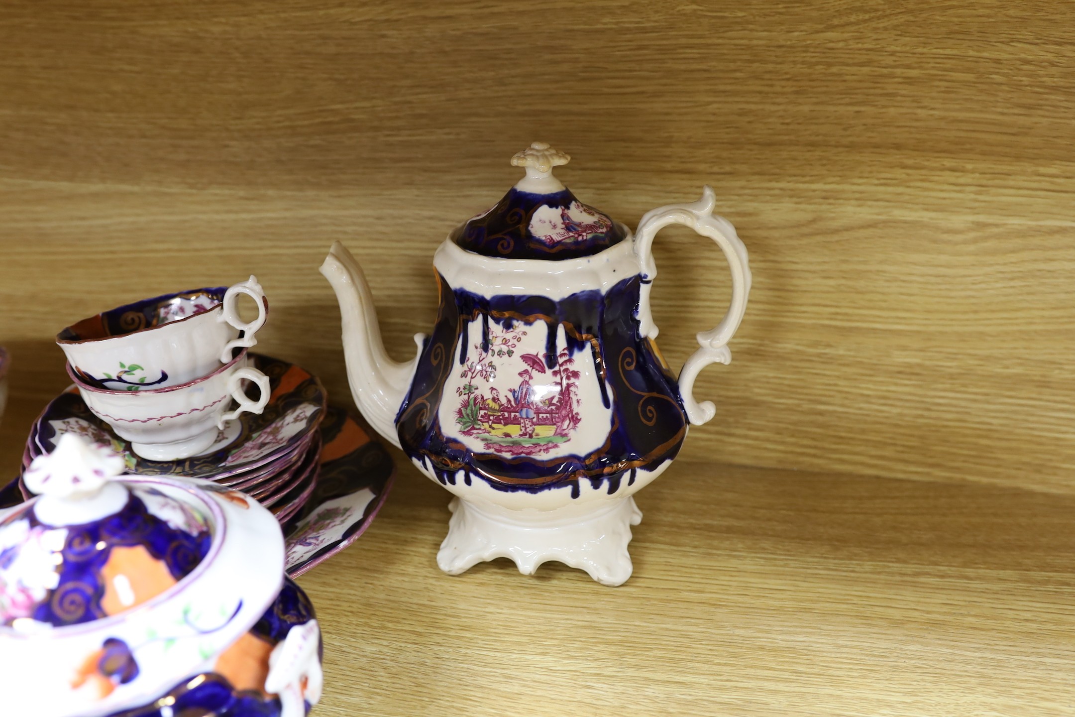 A quantity of Gaudy Welsh lustre tea wares with chinoiserie motifs